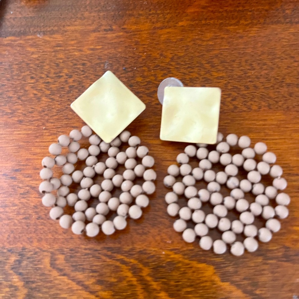 New brown weave, and gold- colored earrings